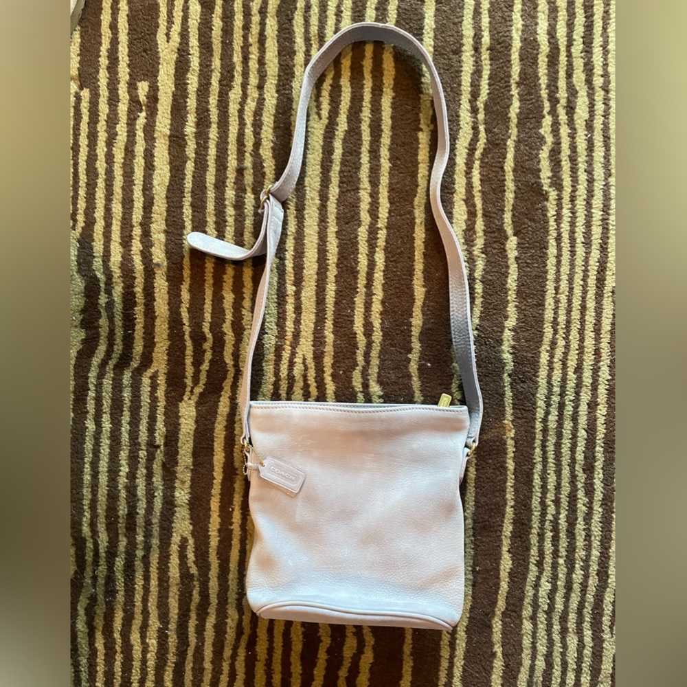 Light purple Coach cross body bucket bag